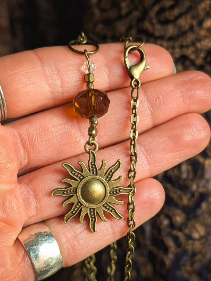 Bronze Sun & Amber Crystal Necklace - Image 2